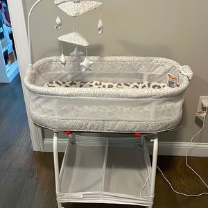 Delta children Auto Glide Bassinet with bluetooth
